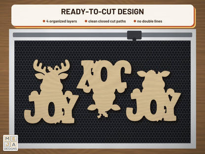 Reindeer JOY Ornament laser cut file: the cut file on a laser bed