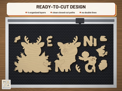 Nice List Reindeer Ornament laser cut file: the cut file on a laser bed