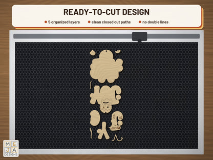 Gingerbread JOY Ornament laser cut file: the cut file on a laser bed