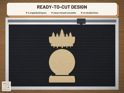 Pine Forest Noel Sign laser cut file: the cut file on a laser bed