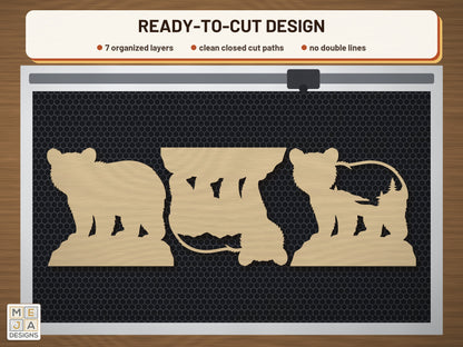 Bear Cub Mountain Sitter laser cut file: the cut file on a laser bed
