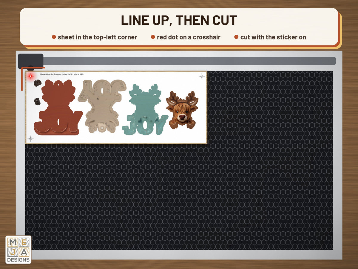 Highland Cow Joy Ornament sticker pack: the stickered board on a laser bed